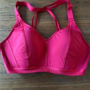 More of a red color sports bra.  Pics make it look more pink